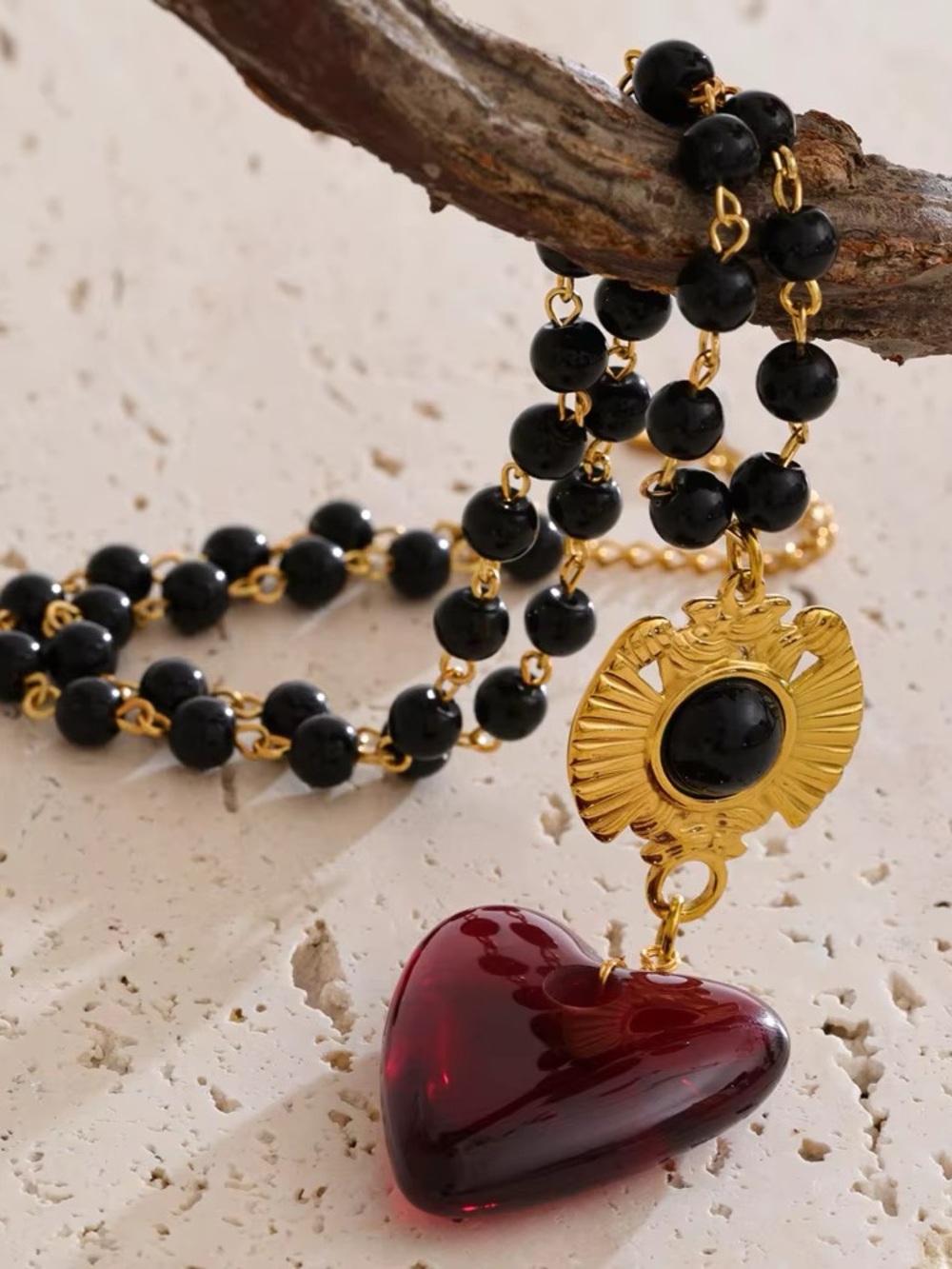 Gold-Plated Black Beaded Necklace with Red Heart Pendant